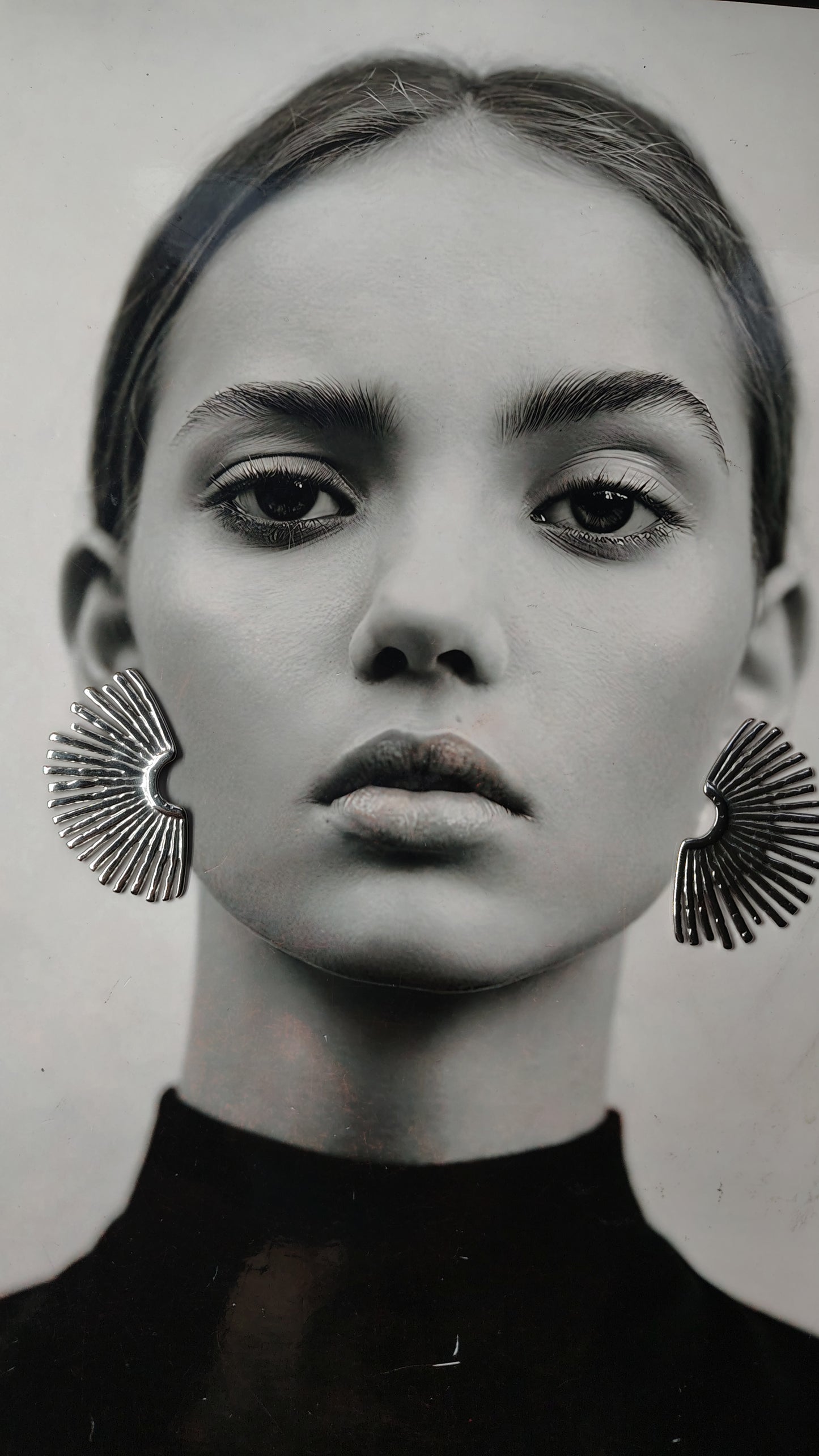 Orecchini lobo con raggi solari