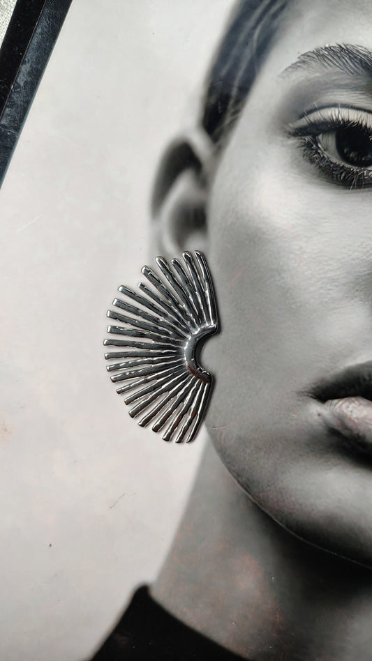 Orecchini lobo con raggi solari