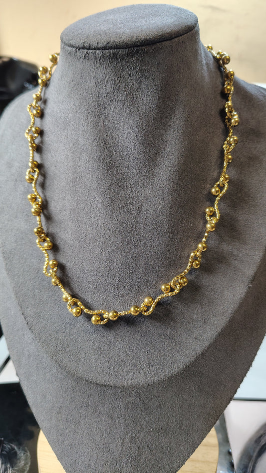 Collana catena con maglie a graffetta ondulata