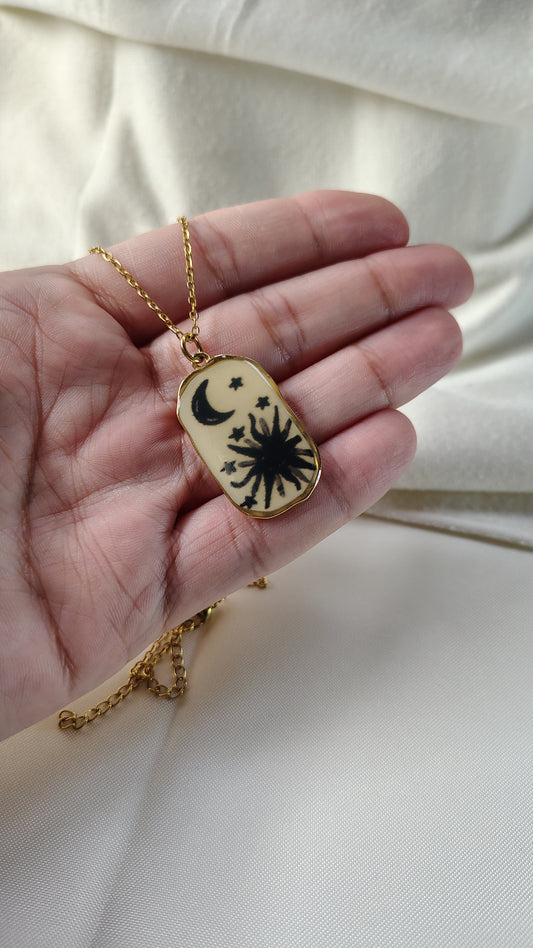 Collana con sole e mezzaluna