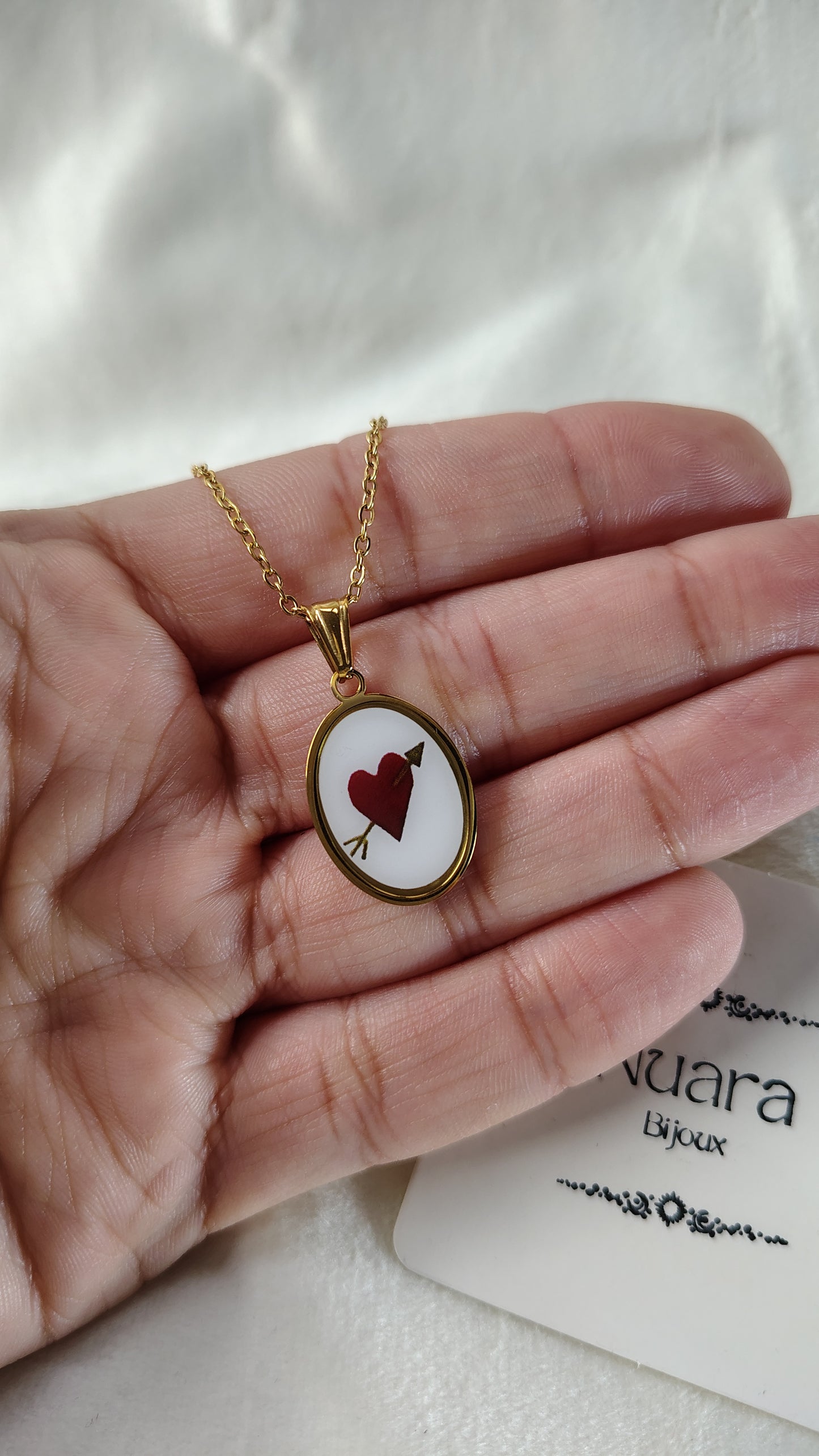 Collana con cuore trafitto da freccia
